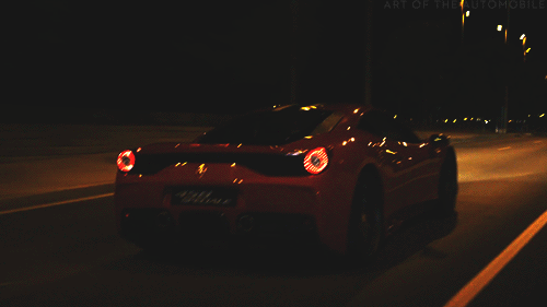 Ferrari driving on highway